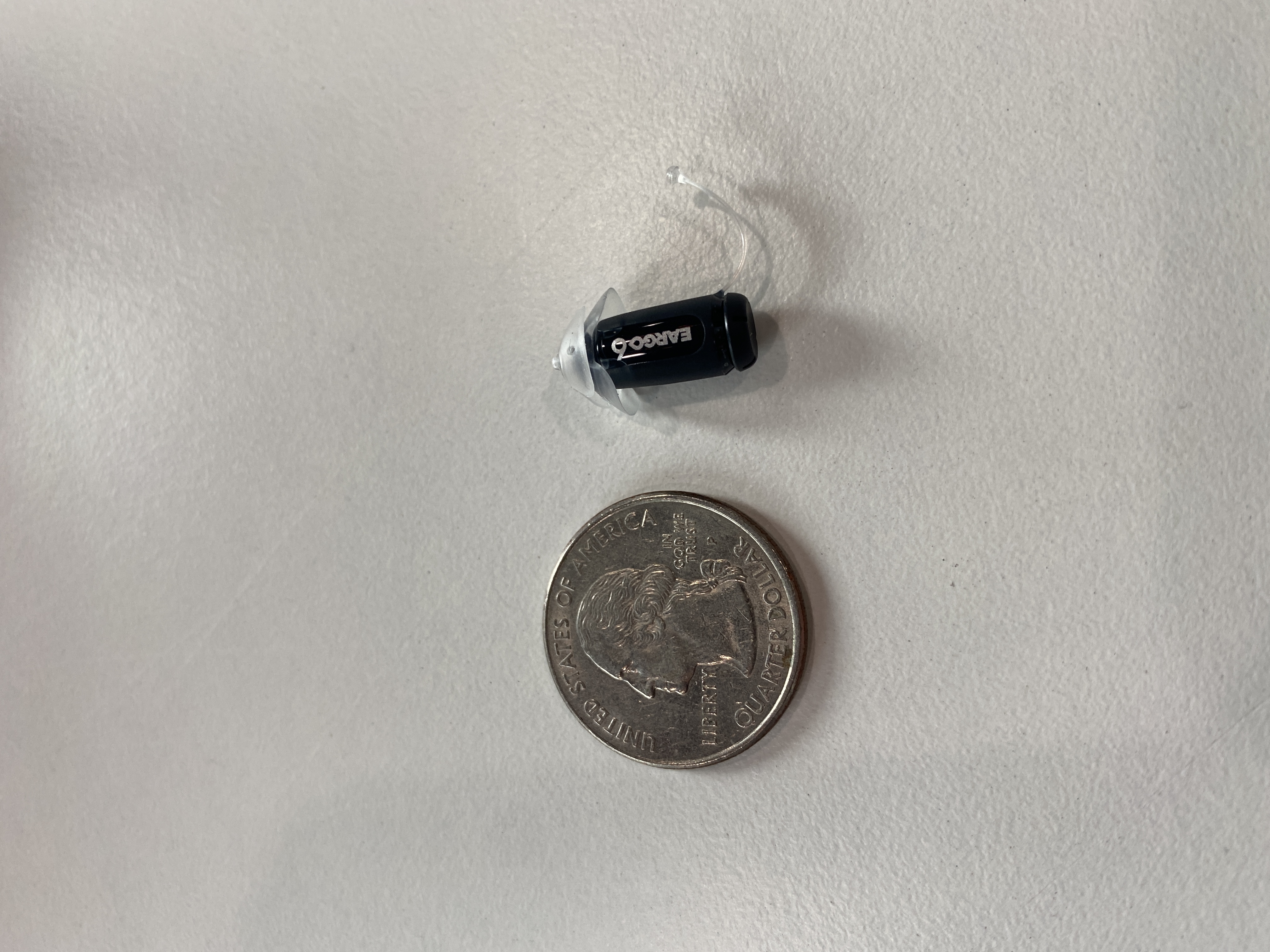 Eargo 6 size compared to a quarter