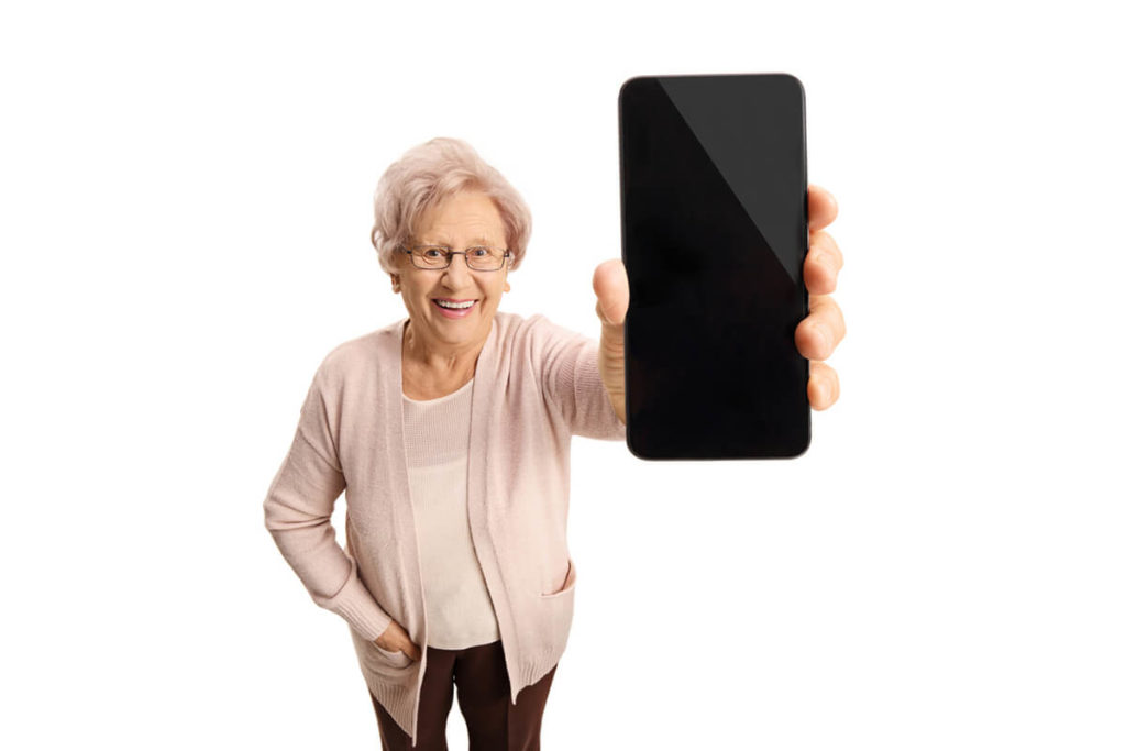 Senior lady showing phone