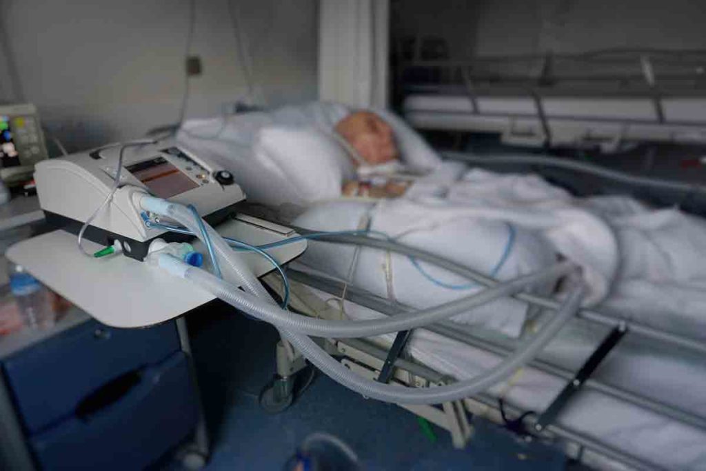 elderly man on ventilator