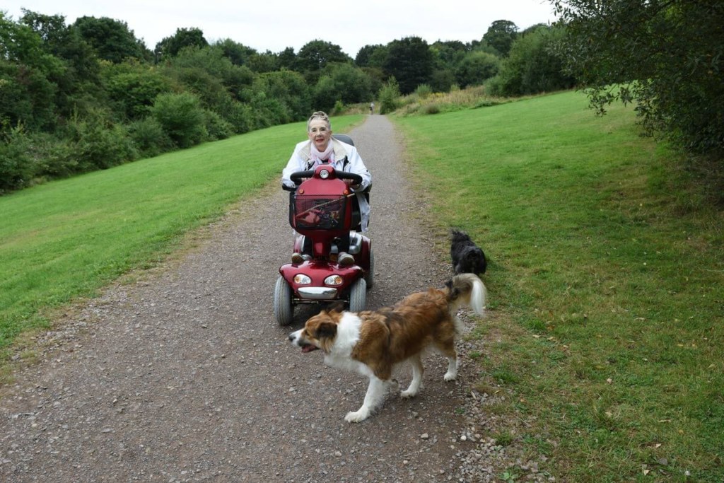 Elderly on heavy duty scooter