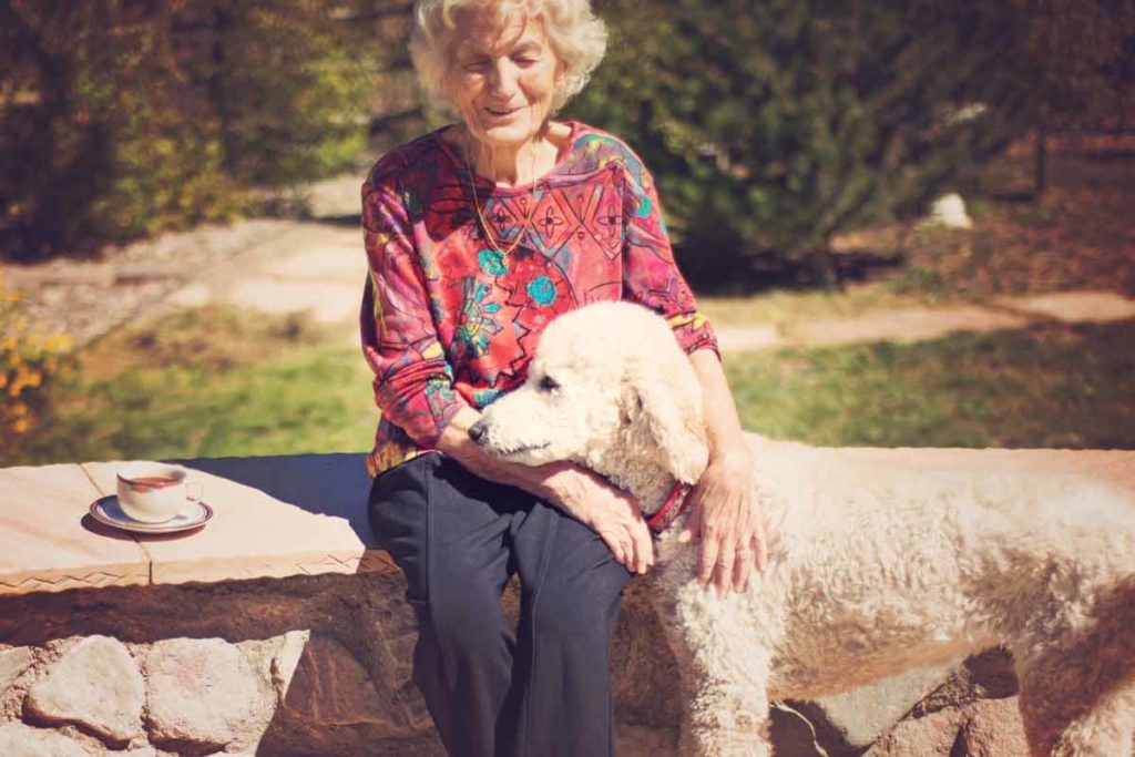 senior woman and her dog